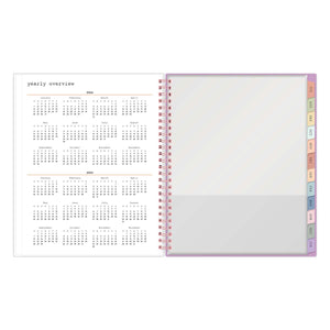 2024-2025 Weekly monthly planner featuring a reference monthly calendar and storage pocket in 7x9 size.