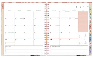2022-2023 Weekly Planner notes monthly spread featuring clean writing space, lined notes section, monthly goals and priorities, and multi-colored monthly tabs in a 8x10 planner size.