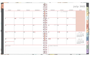 2022-2023 Weekly Planner notes monthly spread featuring clean writing space, lined notes section, monthly goals and priorities, and multi-colored monthly tabs in a 8x10 planner size.