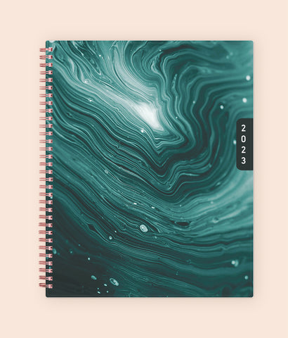 WAAV's 2023 weekly monthly planner in 8.5x11 size features a sophisticated yet classic wavy crystal blue/green cover
