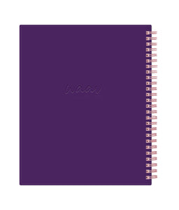 the 2023 weekly monthly planner from WAAV in 7x9 size features a solid purple back cover and rose gold binding