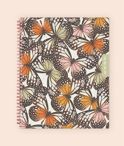 this beautiful 2023 waav planner in 8.5x11 features a front cover with butterflies to start your wondeful day
